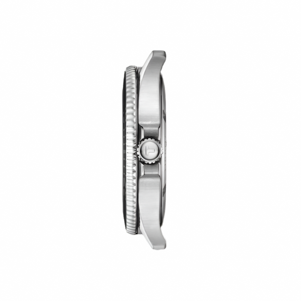 Close-up of a silver watch with detailed design on a white background